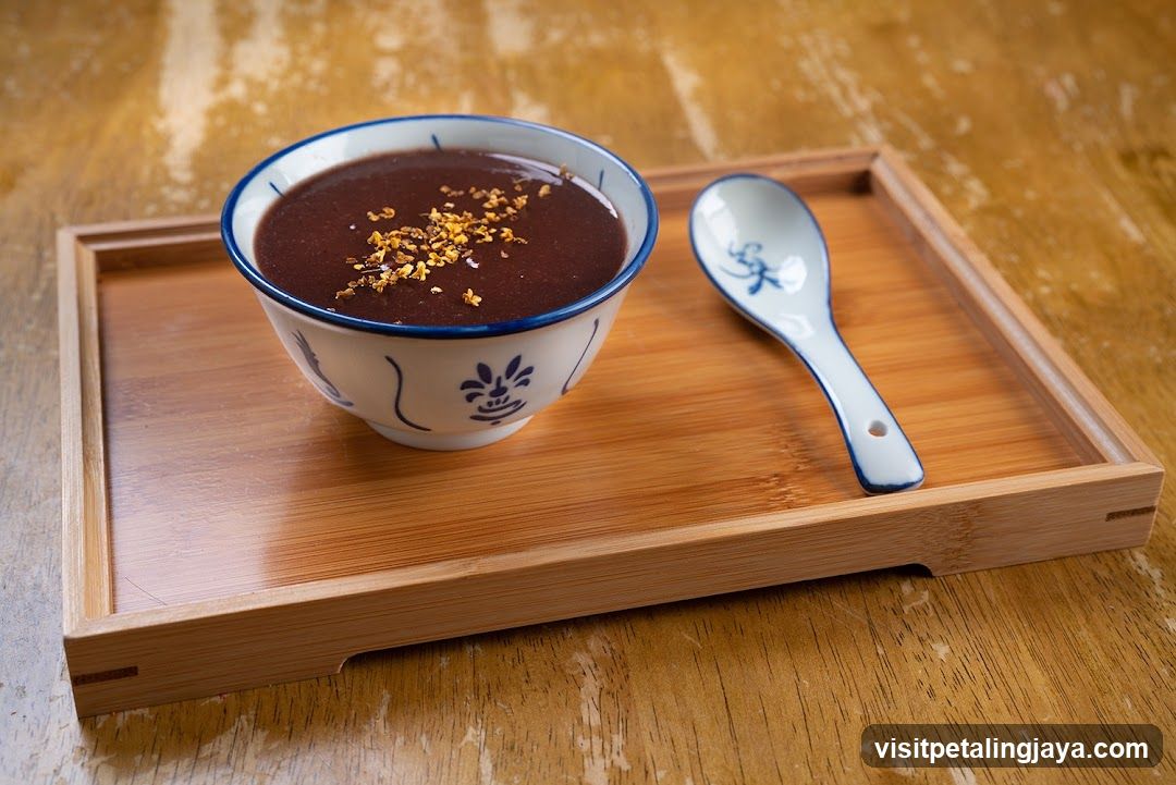 Bowl of Dark Dessert with Garnish