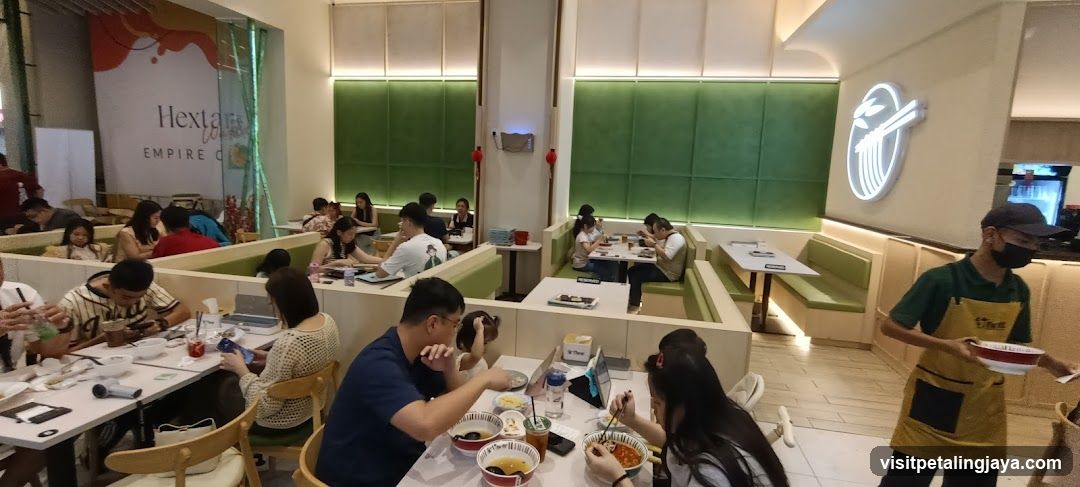 Restaurant Interior with Diners and Staff