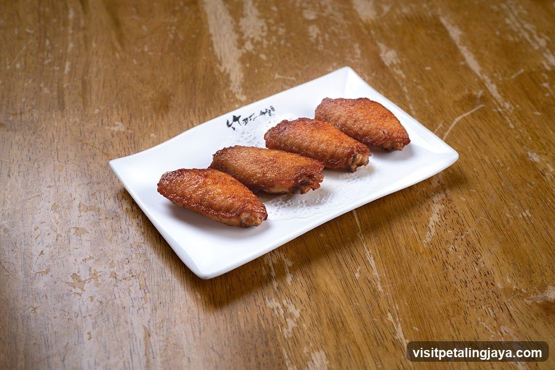 Fried Chicken Wings on a White Plate