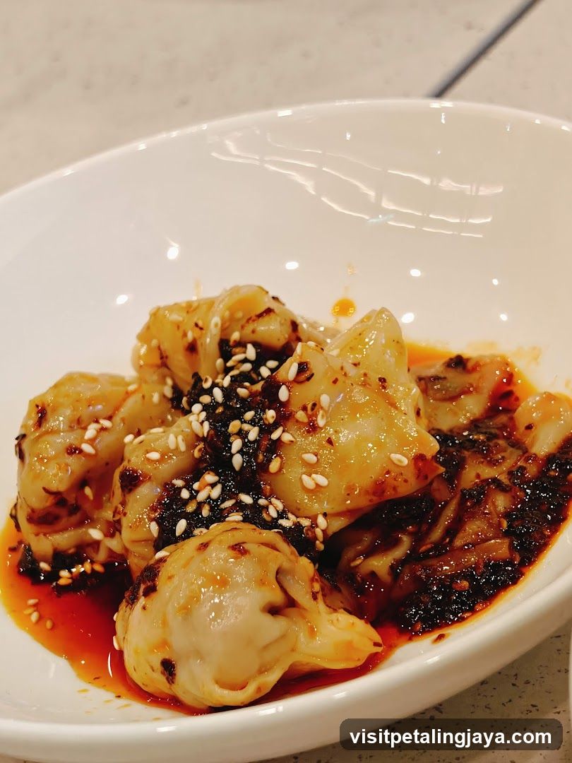 Spicy Dumplings with Sesame Seeds