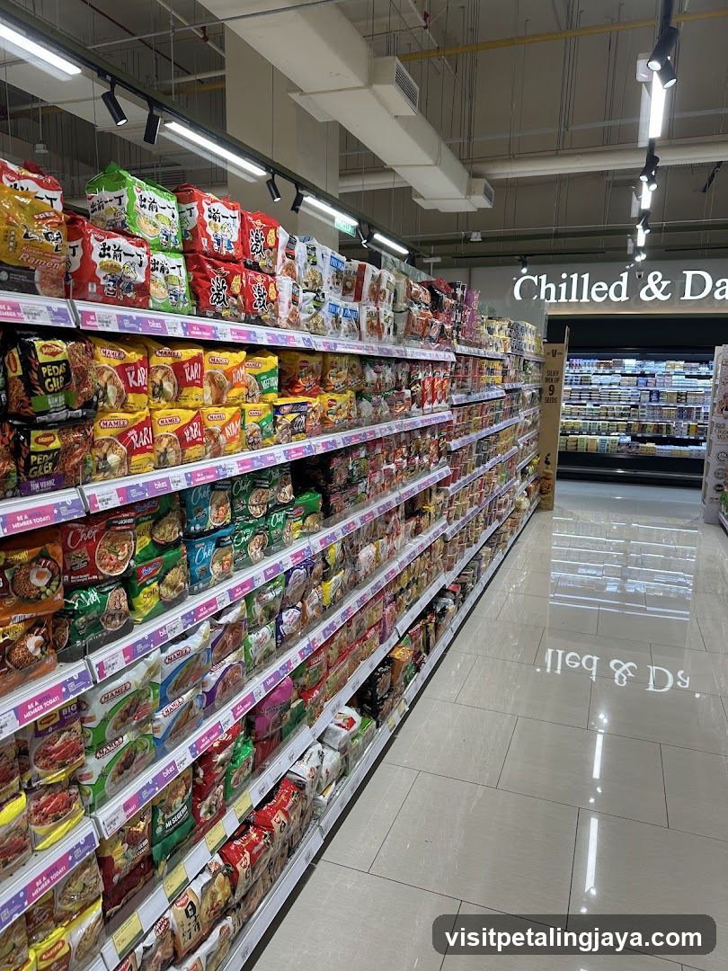 Aisle of instant noodles and snacks in a supermarket