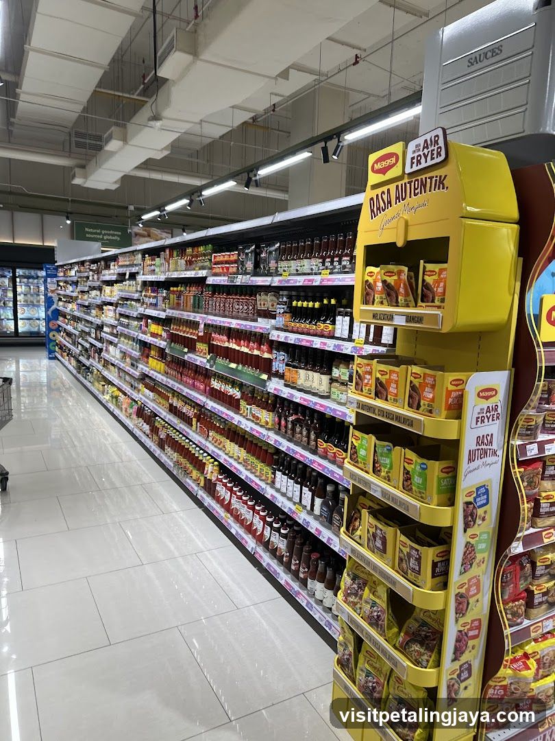 Grocery Store Aisle with Condiments and Instant Noodles Display