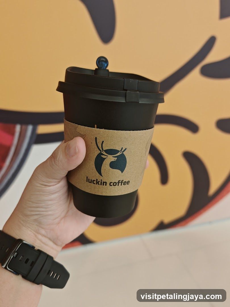 luckin coffee cup held in hand