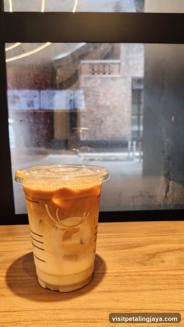 Iced Coffee Drink on Wooden Table