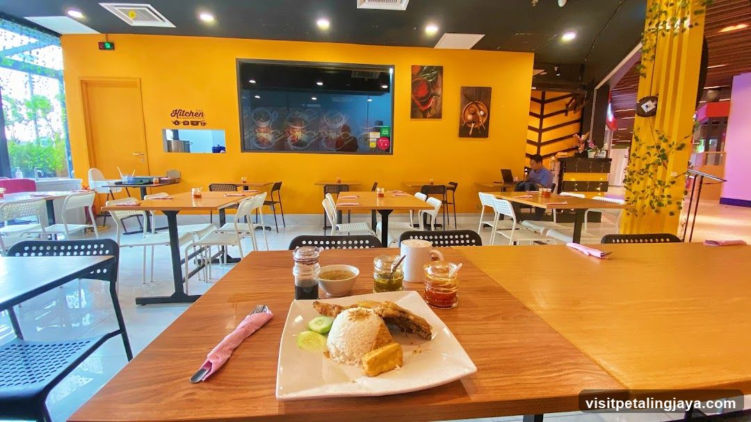 Restaurant Interior with Yellow Walls and Breakfast Meal