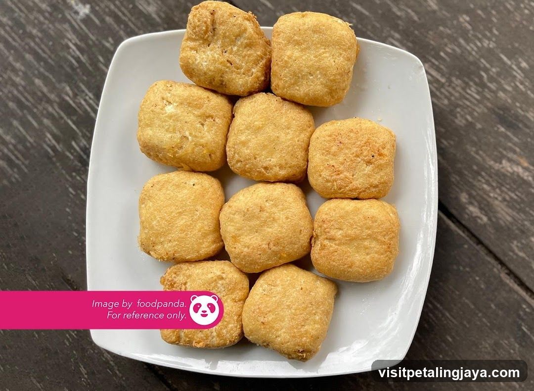 Fried Tofu Cubes on a White Plate