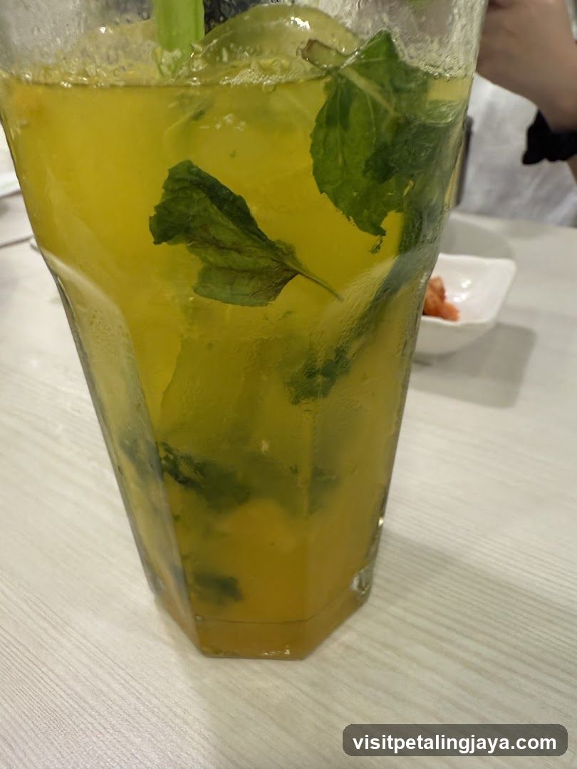 Mint Lemonade with Ice and Straw