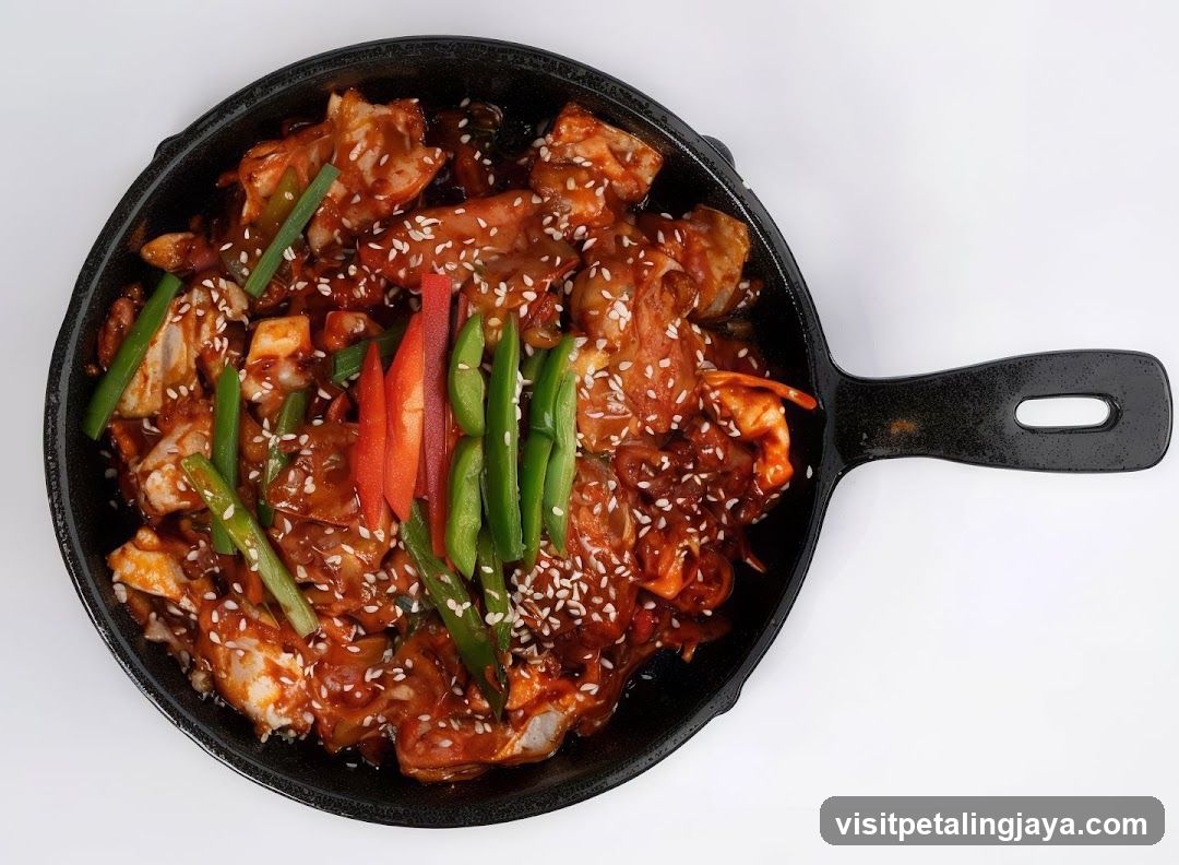 Stir-fried Chicken with Vegetables in Cast Iron Skillet