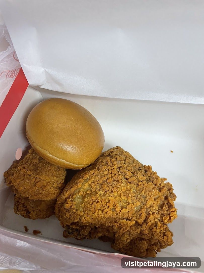 Fried Chicken and Bun in Takeout Box