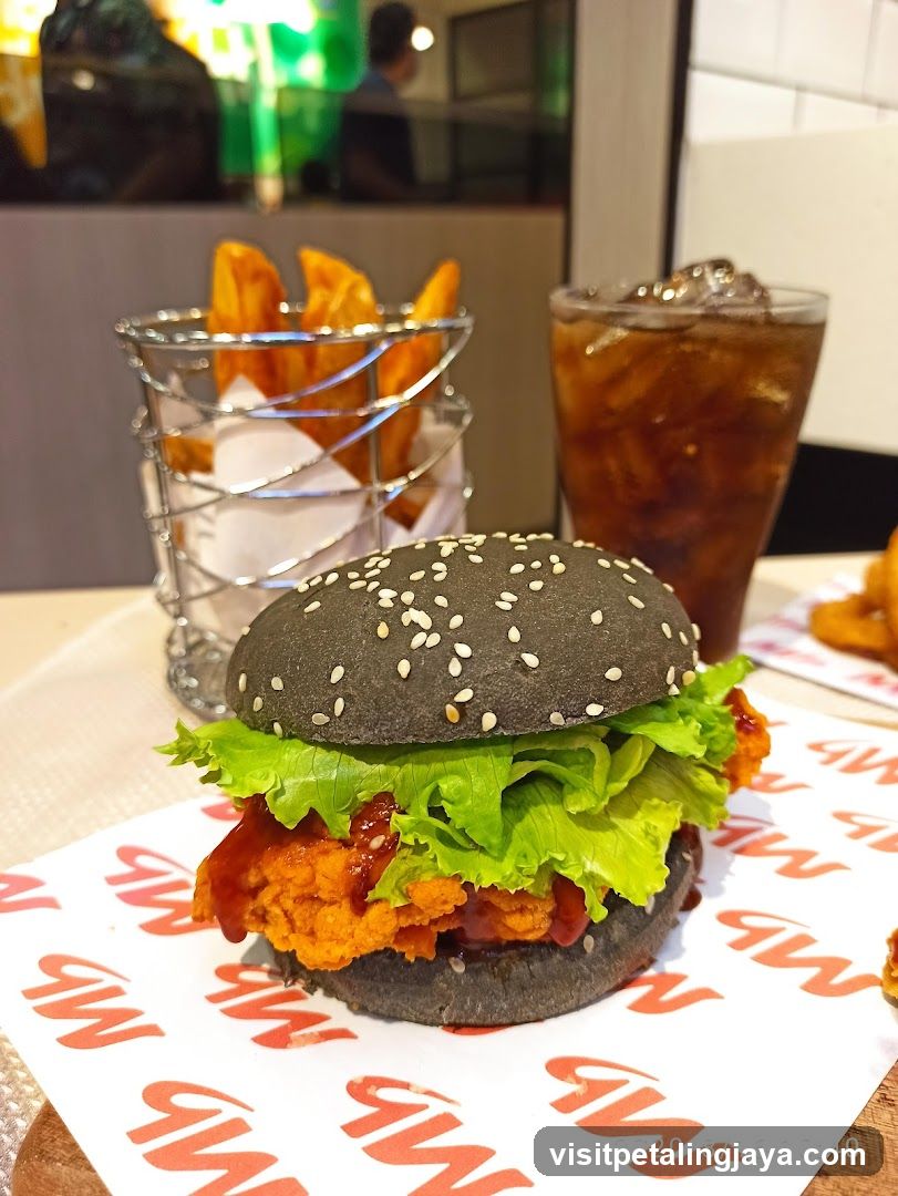 Black Buns Burger with Fried Chicken and Fries