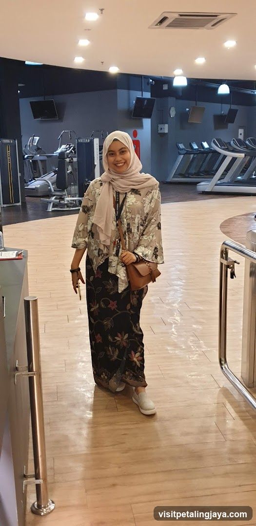 Woman in Gym Interior