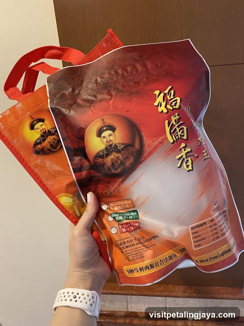 Hand holding packaged food items