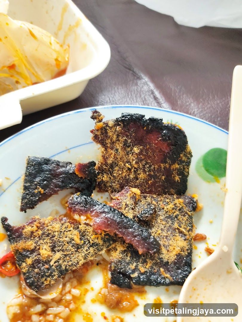Plate of Fried Meat with Rice
