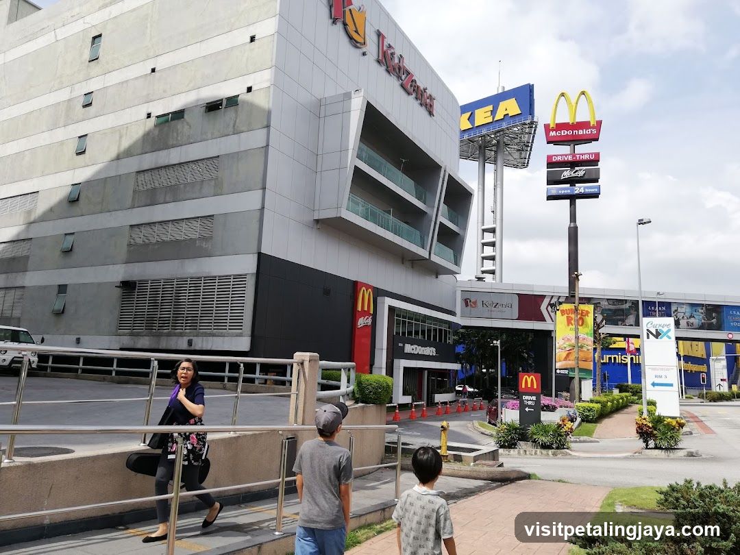 Shopping Complex Exterior with People