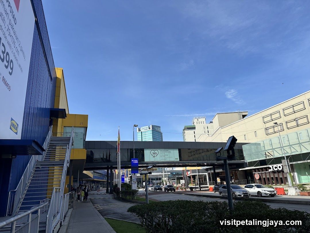 Urban Street Scene with Storefronts and Pedestrian Walkway