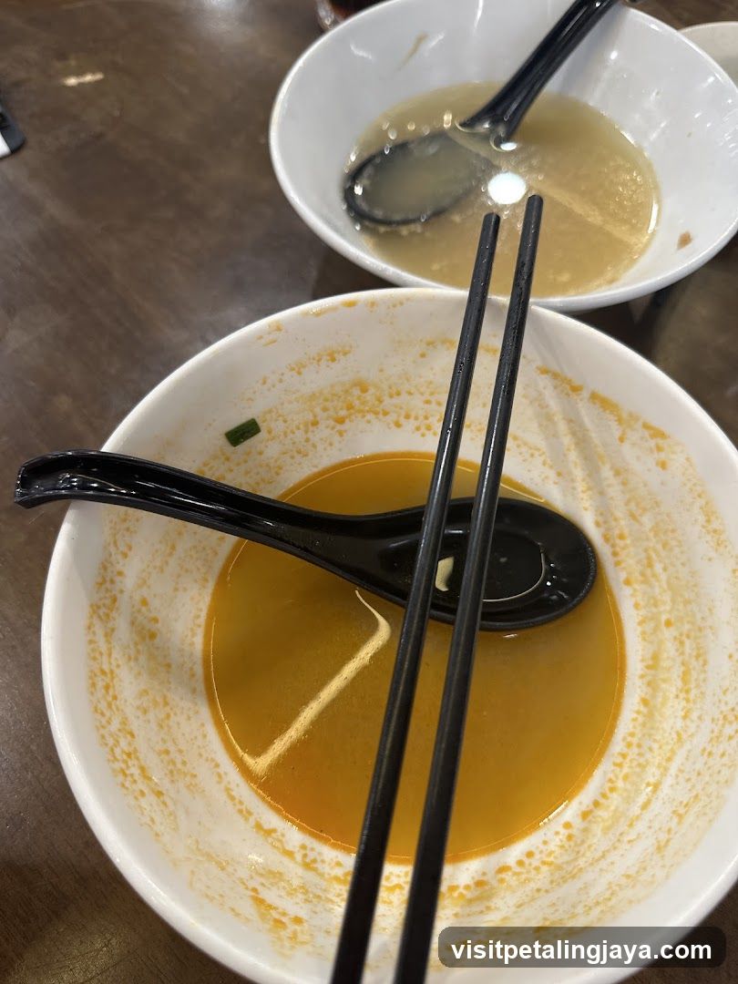 Empty Bowls with Soup Remnants