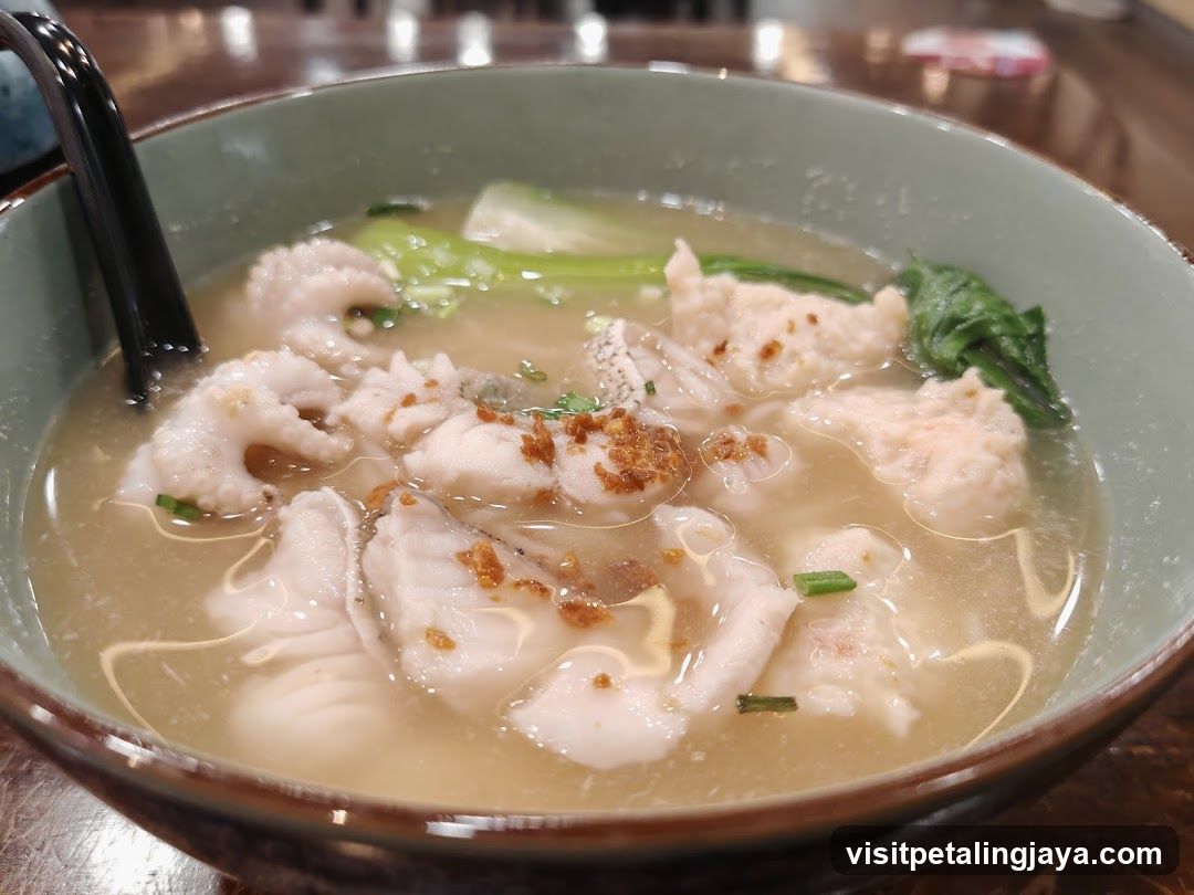 Bowl of Fish Soup with Garnish