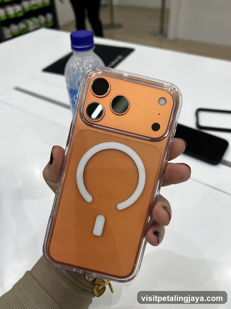Orange iPhone with MagSafe Ring Case