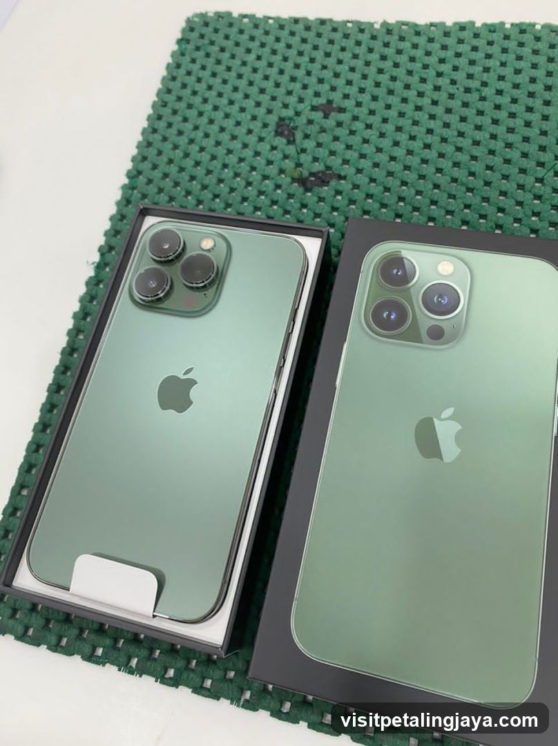 iPhone Boxes on Green Mat