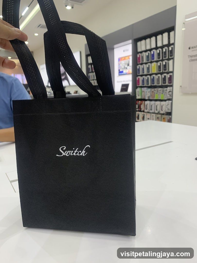 Black Shopping Bag with 'Switch' Logo