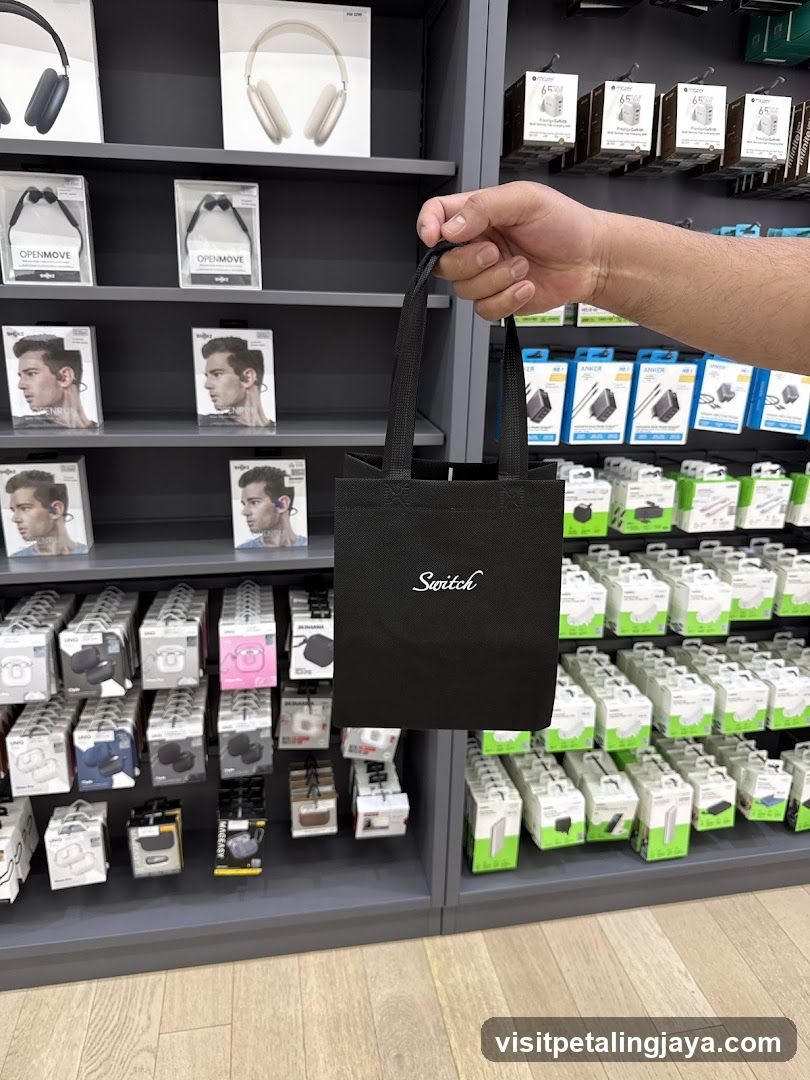 Electronics Store Interior with Shopping Bag