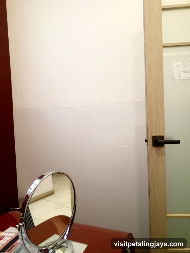 Interior Room with Vanity Mirror and Door