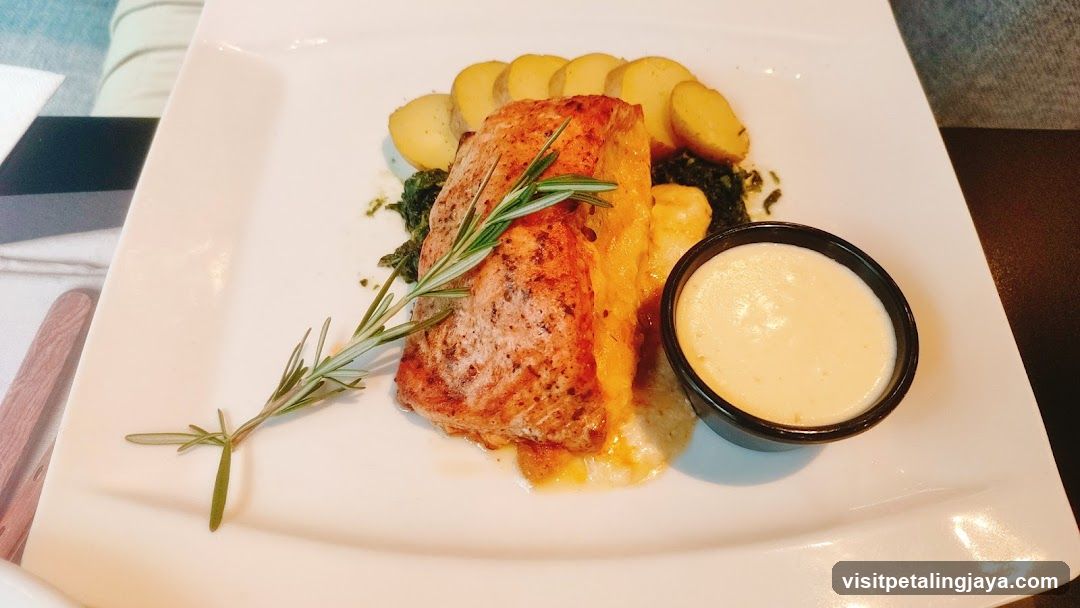 Served Salmon with Potatoes and Sauce