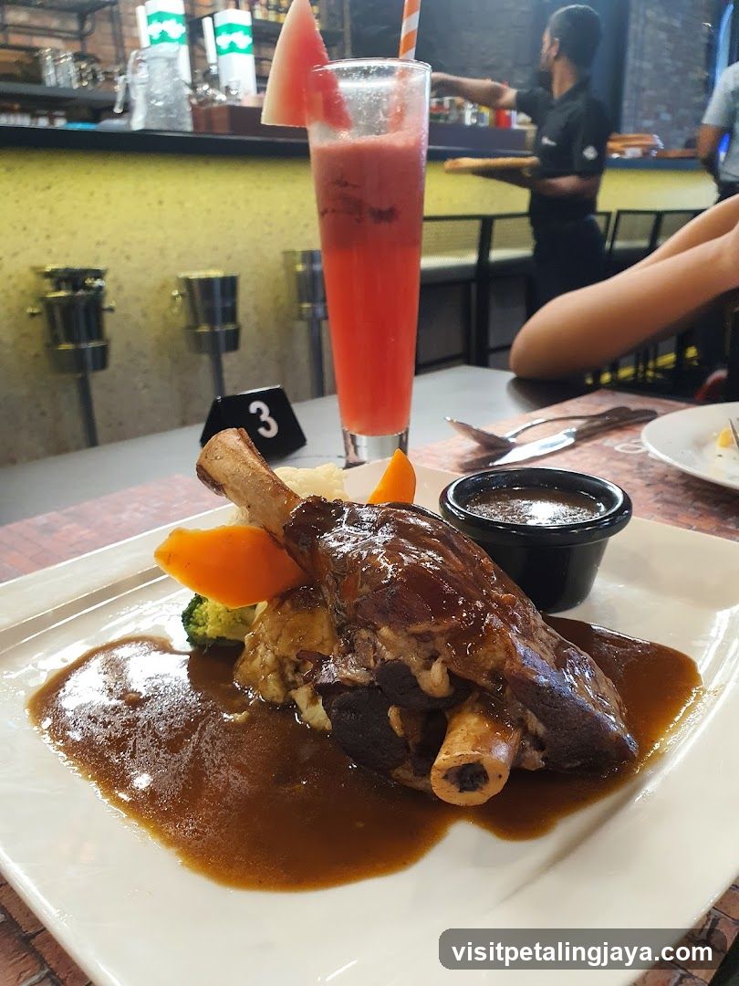 Lamb Shank with Sauce and Drink