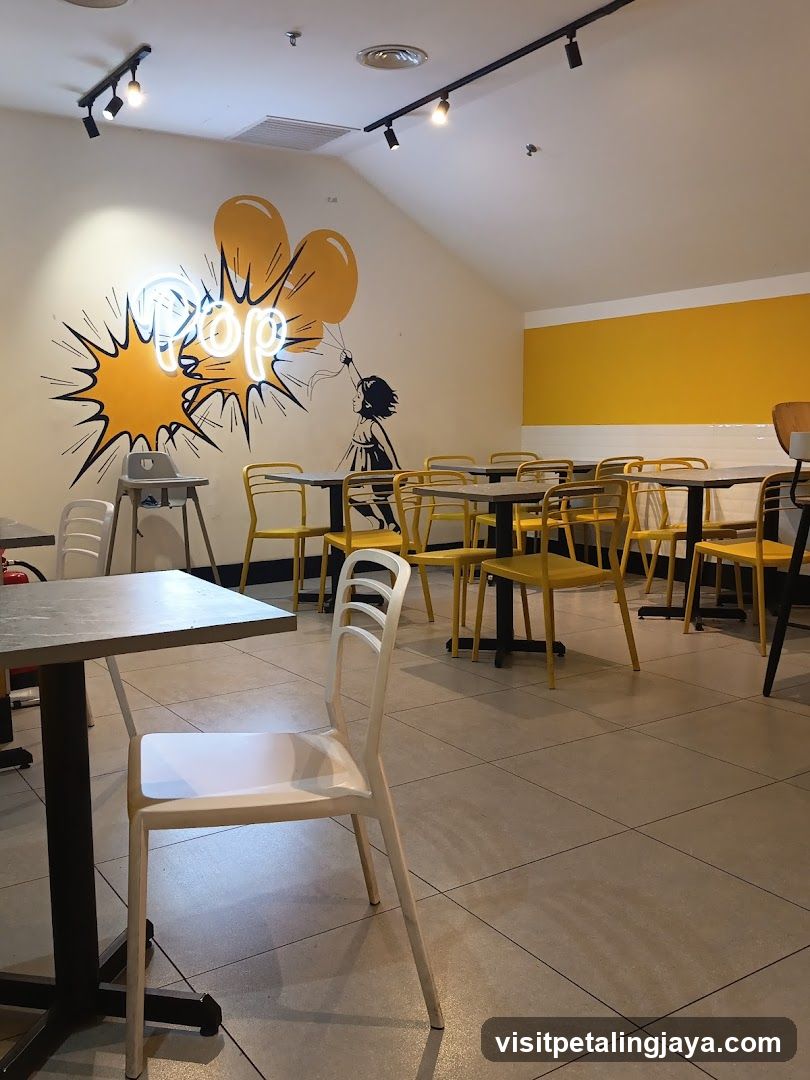 Interior of a casual dining space with pop art mural