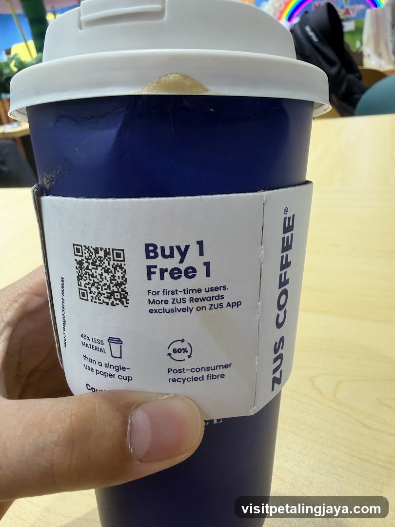 Zus Coffee Cup with Promo Sleeve