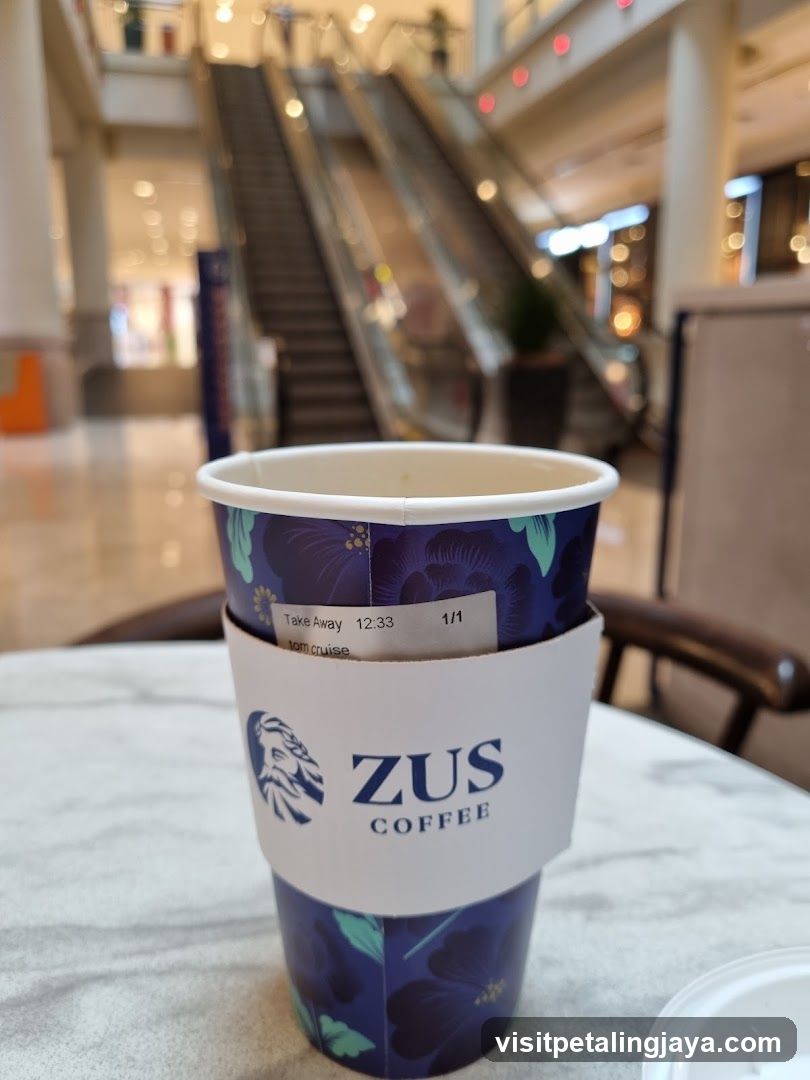 ZUS Coffee Cup in Mall Interior
