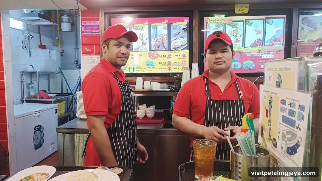 Restaurant Staff in Red Uniforms