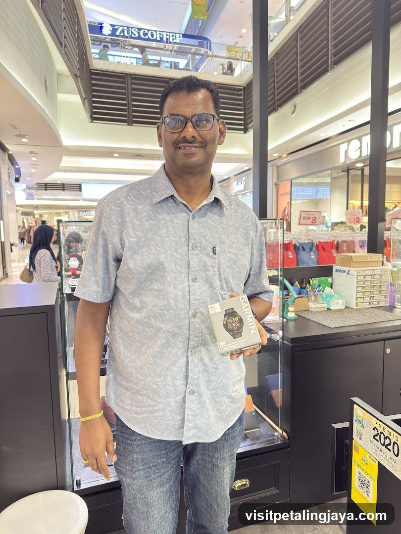 Man holding a watch in mall