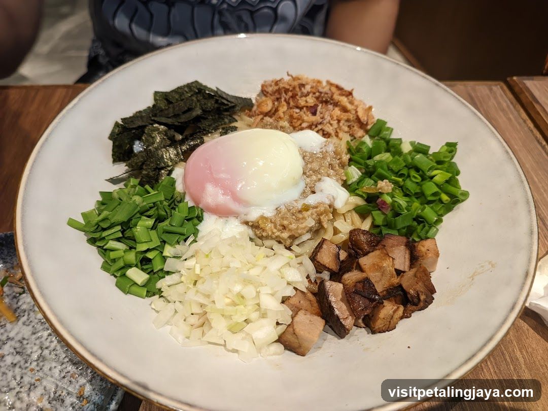 Bowl of Food with Egg and Toppings