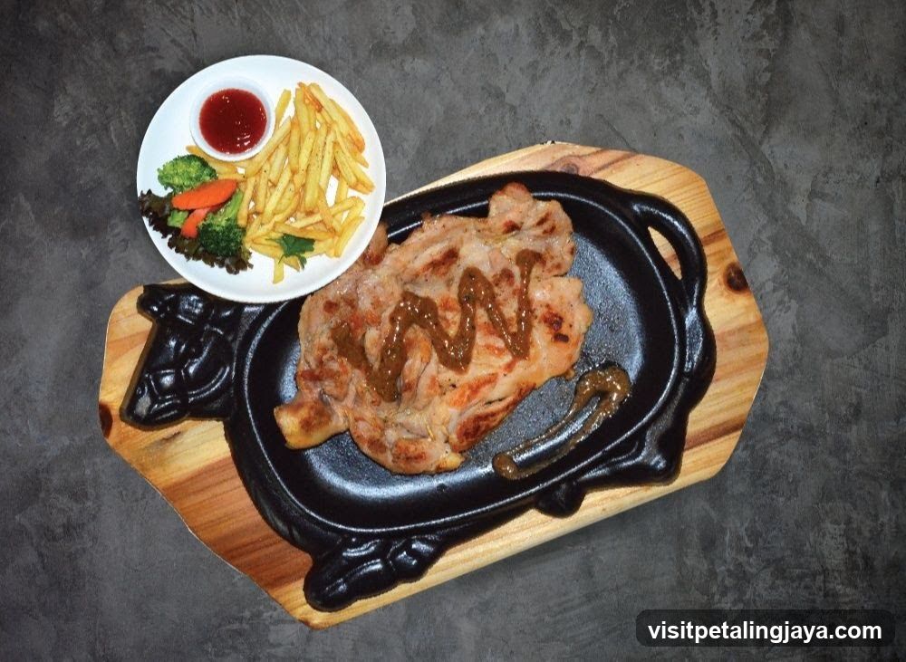 Sizzling Steak with Fries and Salad