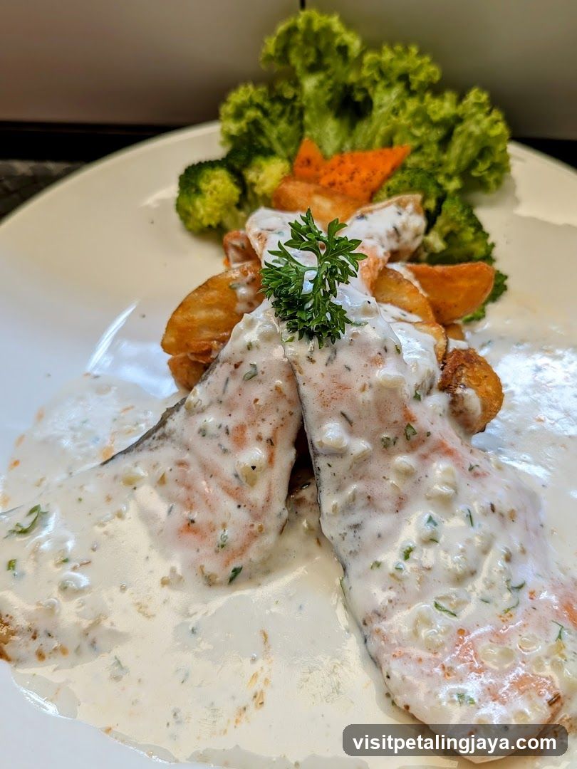 Fish with Creamy Sauce and Vegetables