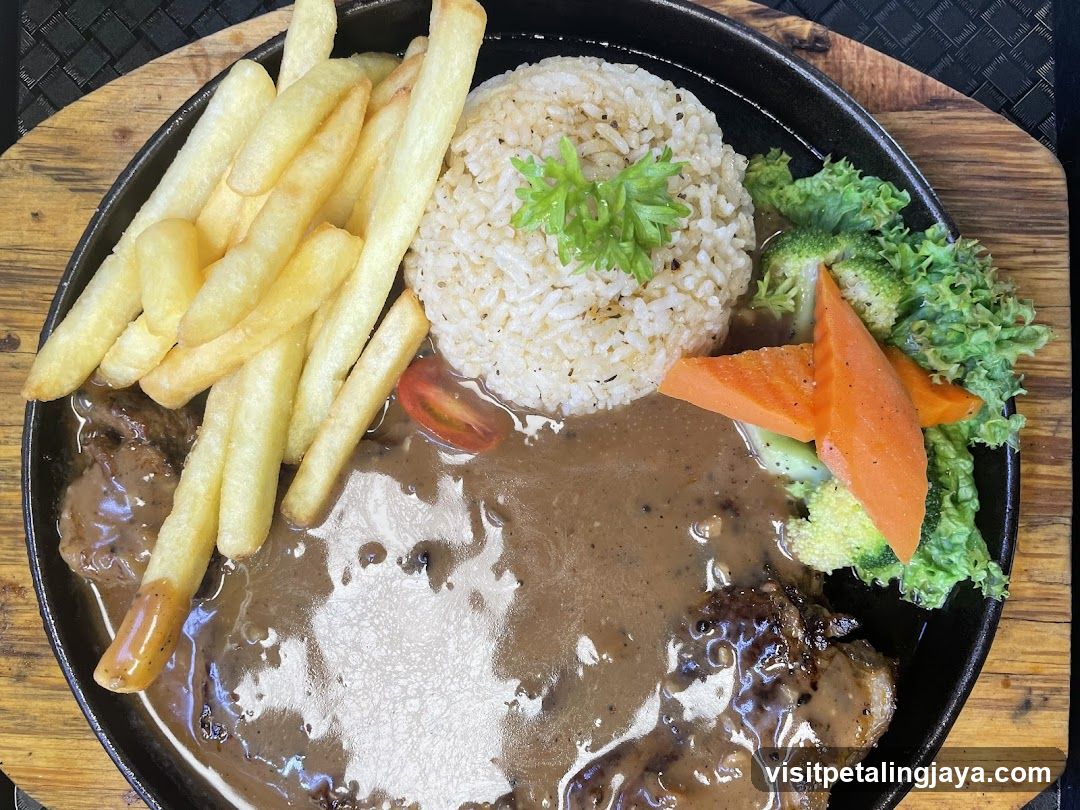Sizzling Steak Plate with Fries and Rice