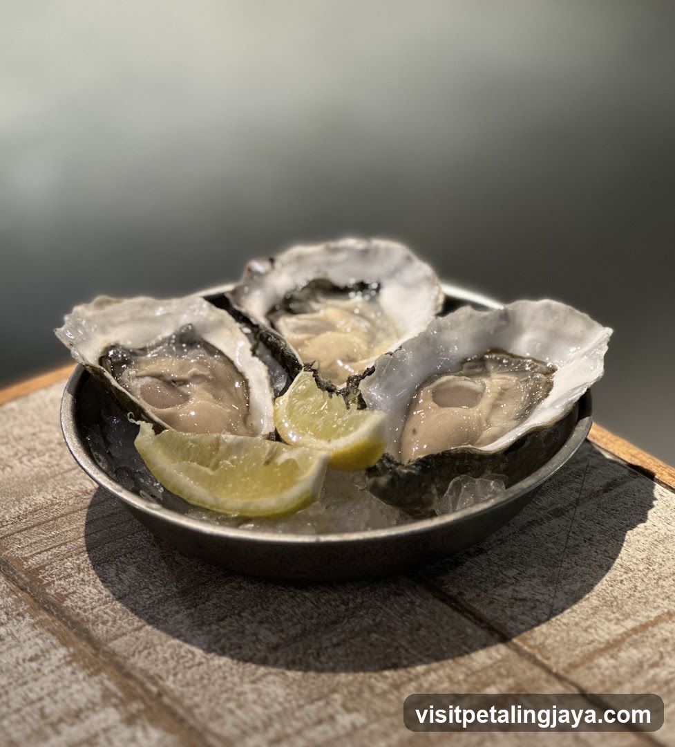 Oysters on Ice with Lemon Wedges