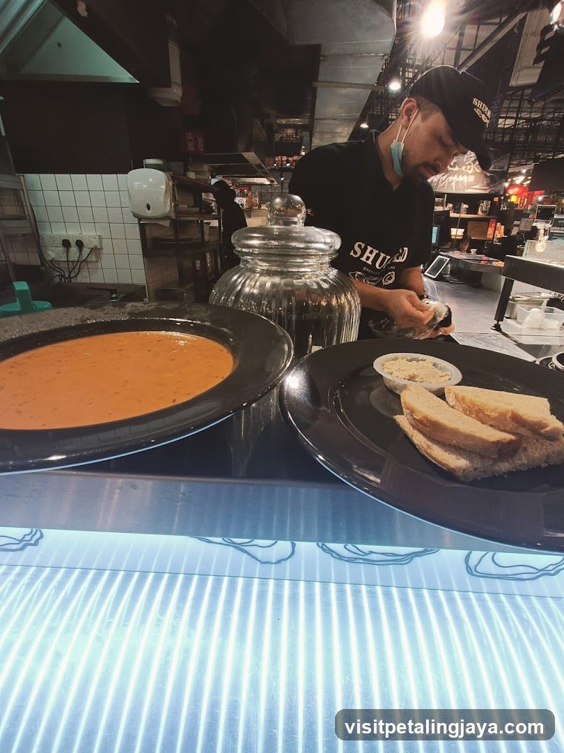 Food Display with Staff in Background