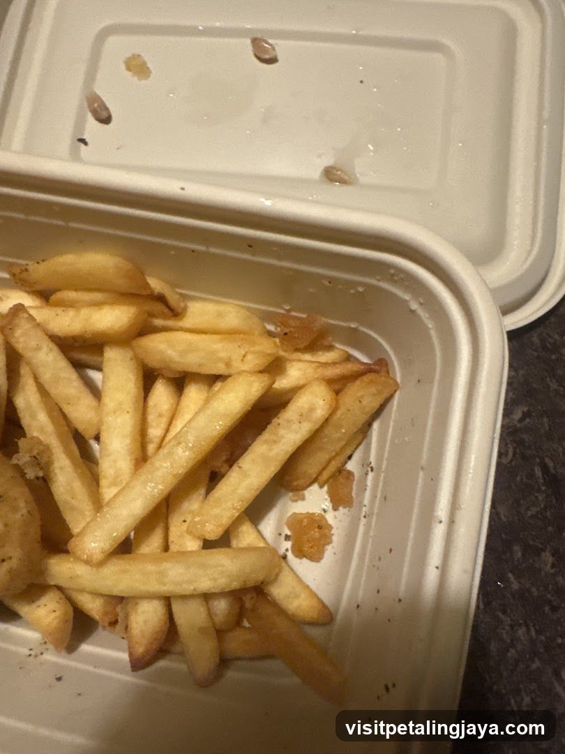 French Fries in Takeout Container