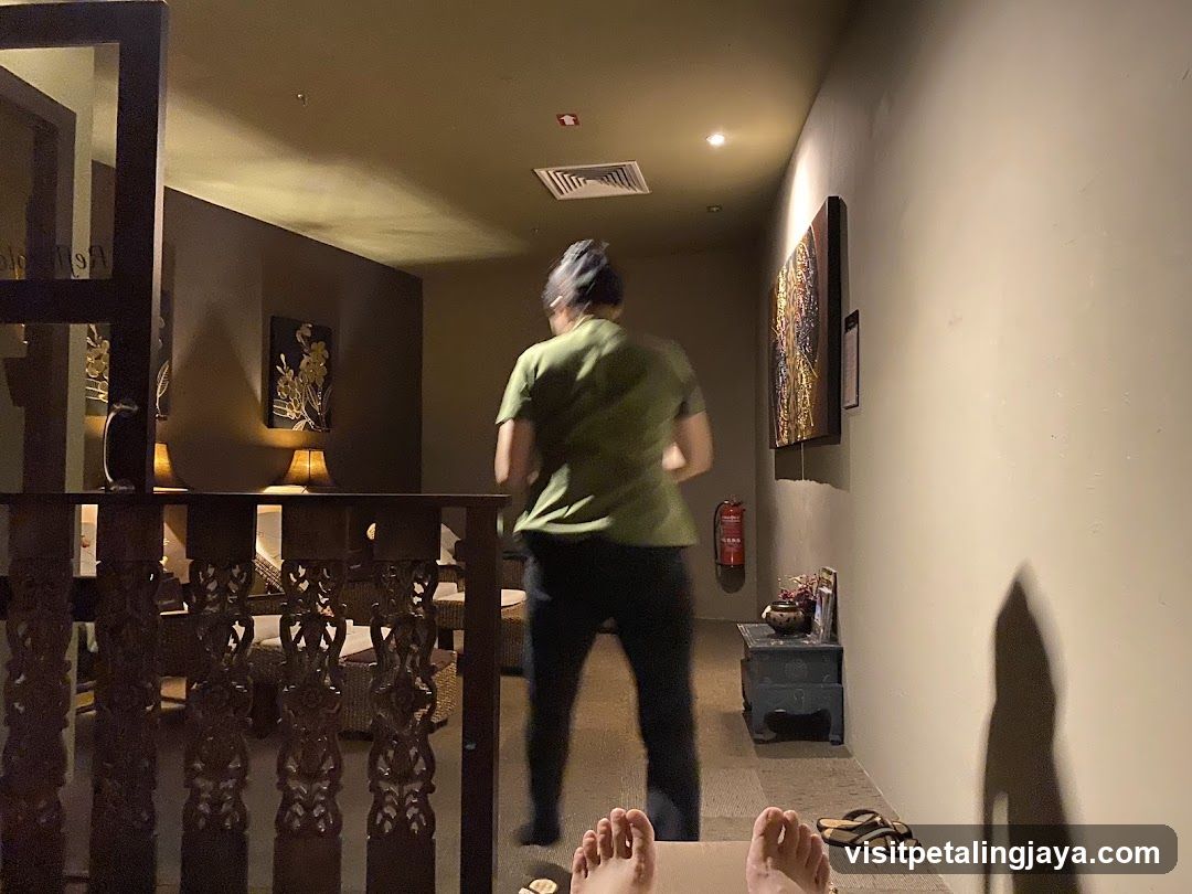 Interior hallway with person walking away