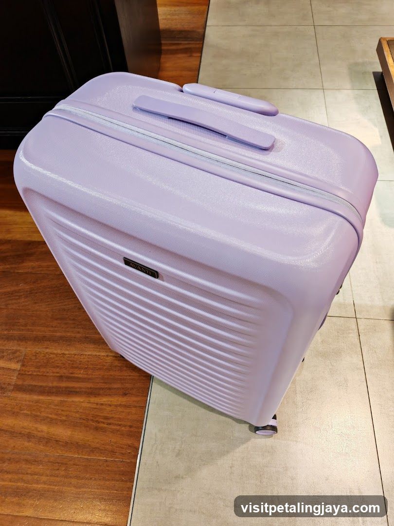 Purple Suitcase on Floor