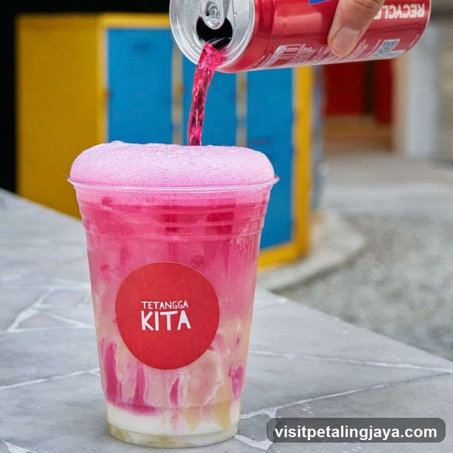 Pink Bubble Drink Pouring