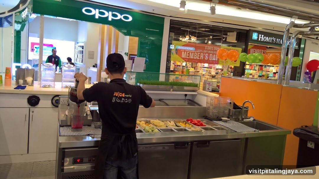 Juice Bar Interior with Staff Preparing Drinks