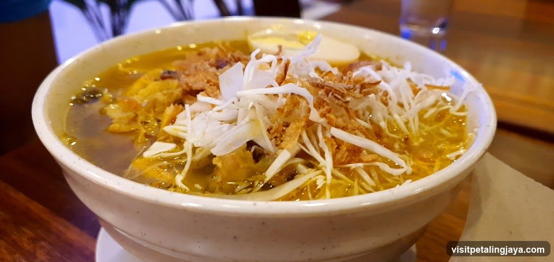 Bowl of Noodle Soup with Toppings
