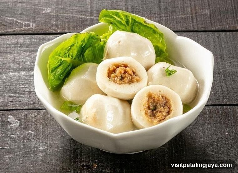 Bowl of Dumplings with Greens