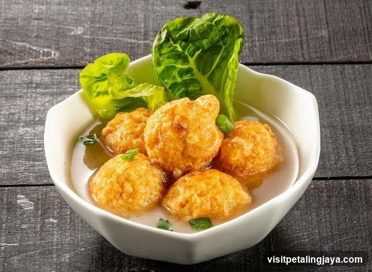 Fried Meatballs in Broth with Greens