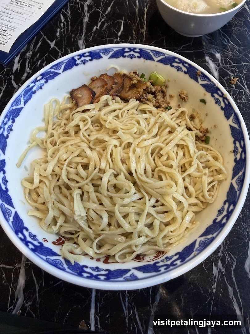 Bowl of noodles with toppings