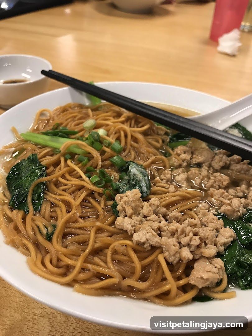 Noodle Dish with Minced Meat and Greens
