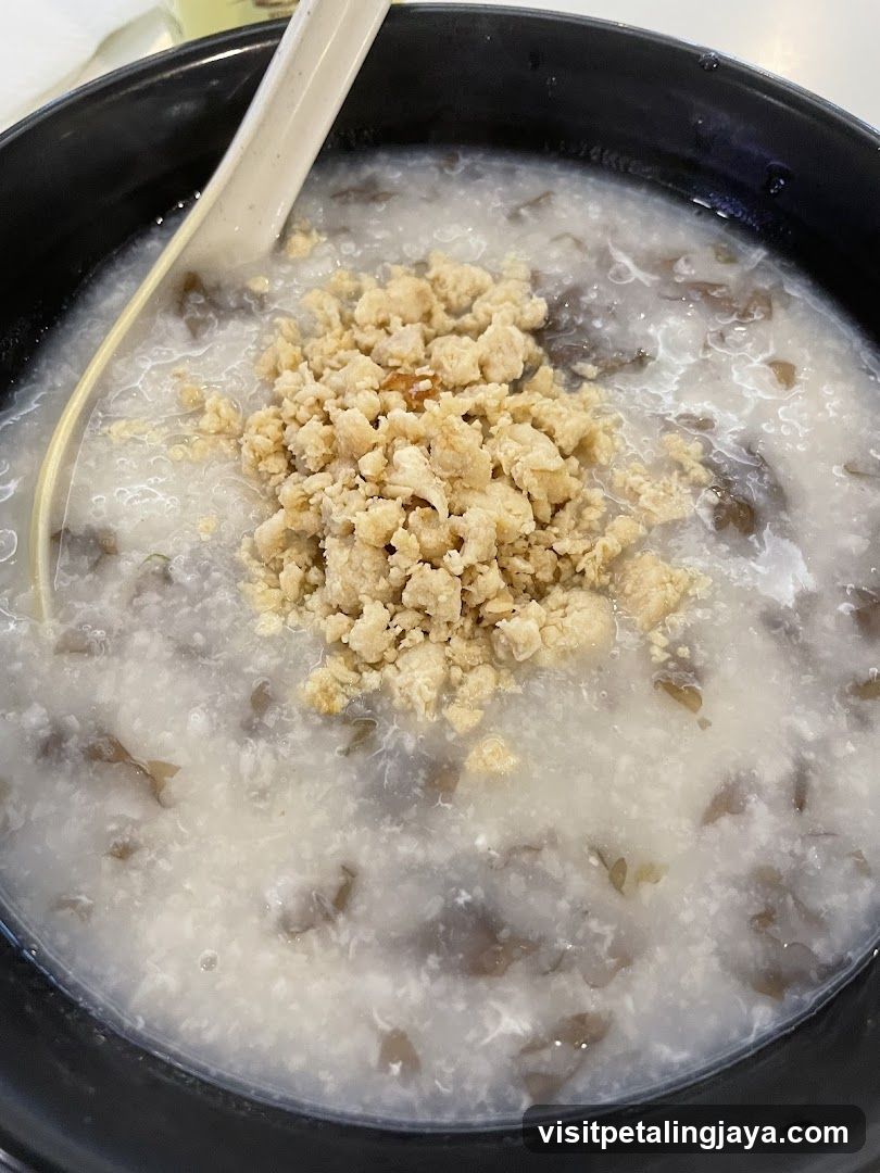 Congee with minced meat topping